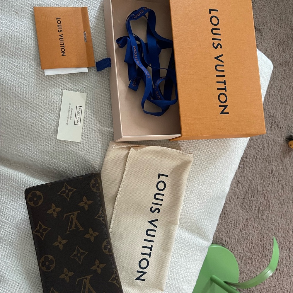 Louis Vuitton Brown Monogram Clutch with Gold Accents